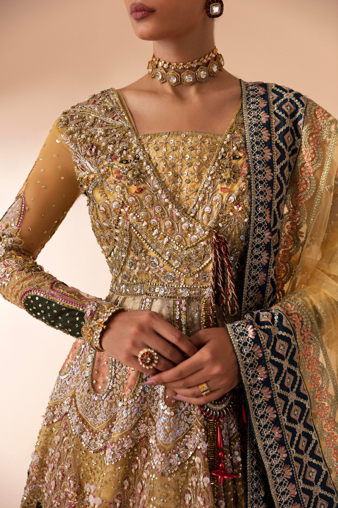Amber Net Pakistani Bridal Outfit with Exquisite Embroidery