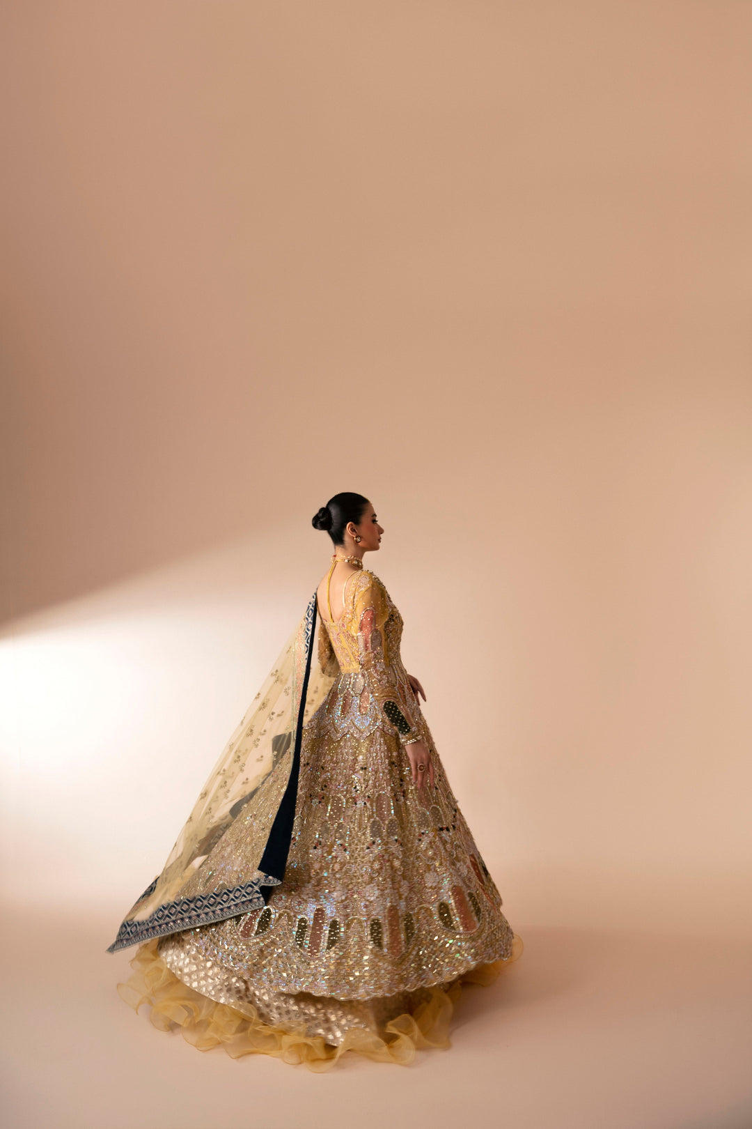 Amber Net Pakistani Bridal Outfit with Exquisite Embroidery