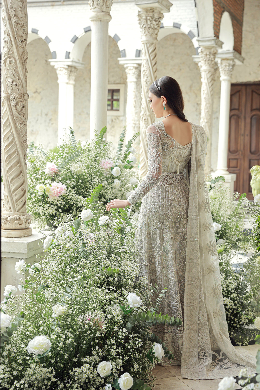 Elegant White Pakistani Bridal Dress with Intricate Embroidery