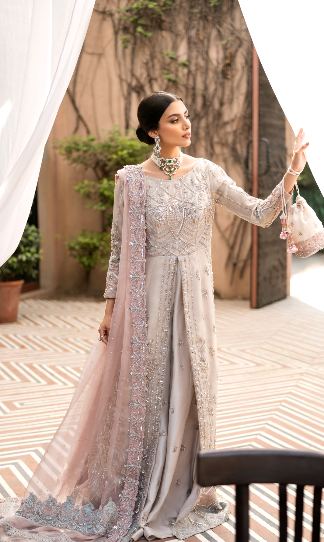 Elegant Offwhite Pakistani Bridal Dress with Peach Accents