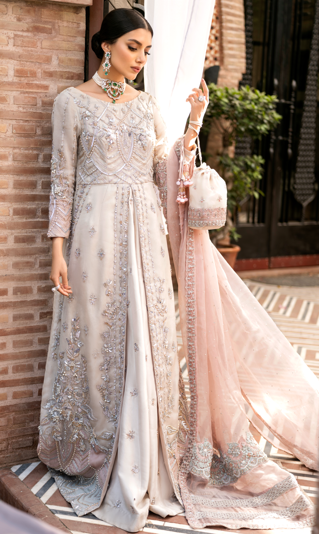 Elegant Offwhite Pakistani Bridal Dress with Peach Accents