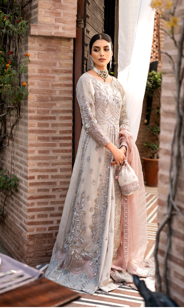 Elegant Offwhite Pakistani Bridal Dress with Peach Accents