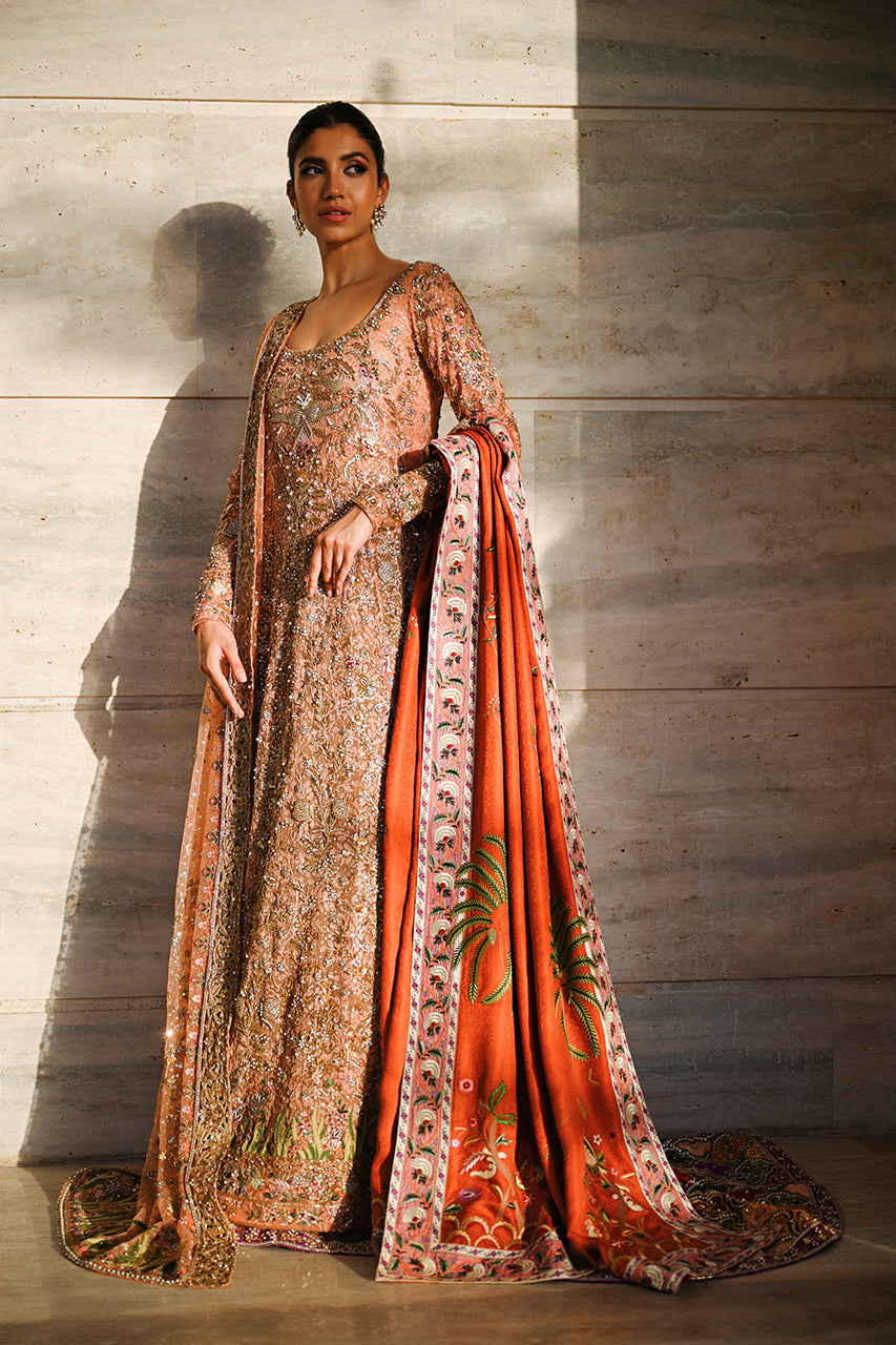 Elegant Peach Pakistani Bridal Lehenga for a Glamorous Wedding