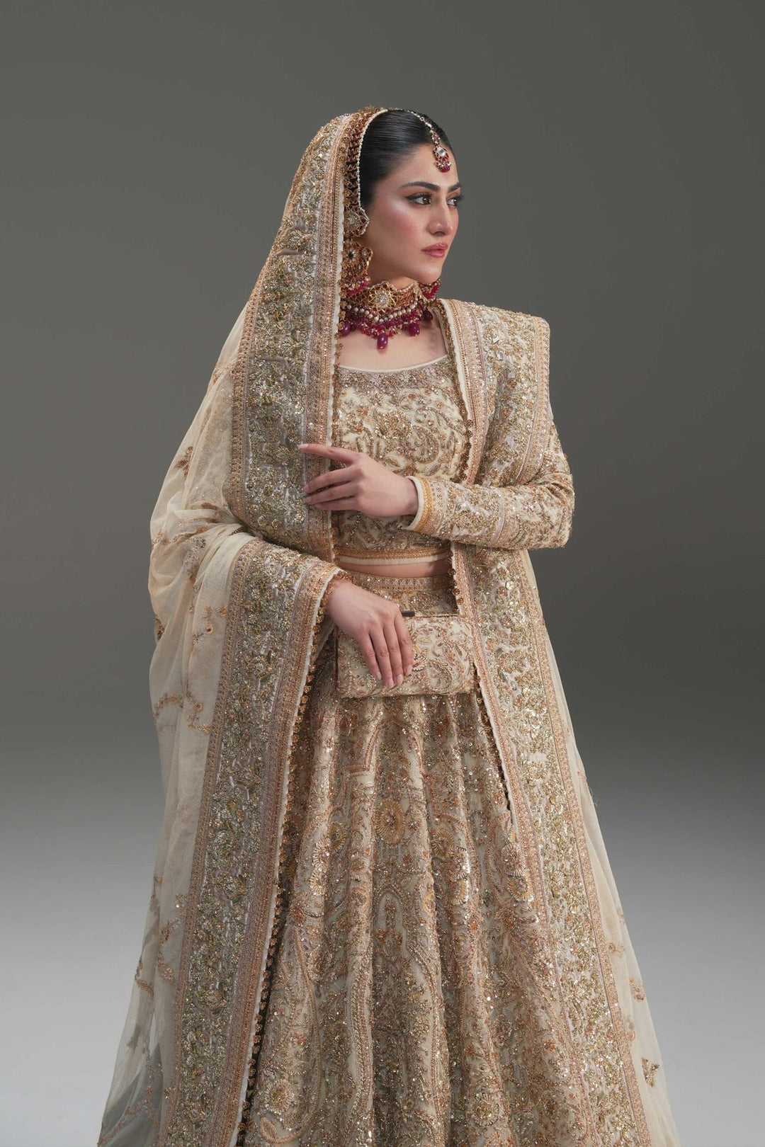Elegant Pakistani Bridal Lehenga in Ivory Net Style