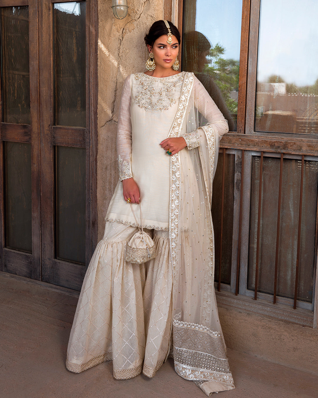 Pakistani Wedding Dress in White Gharara Kameez Style Nameera by Farooq Pakistani Wedding Dress in White Gharara Kameez Style Nameera by Farooq
