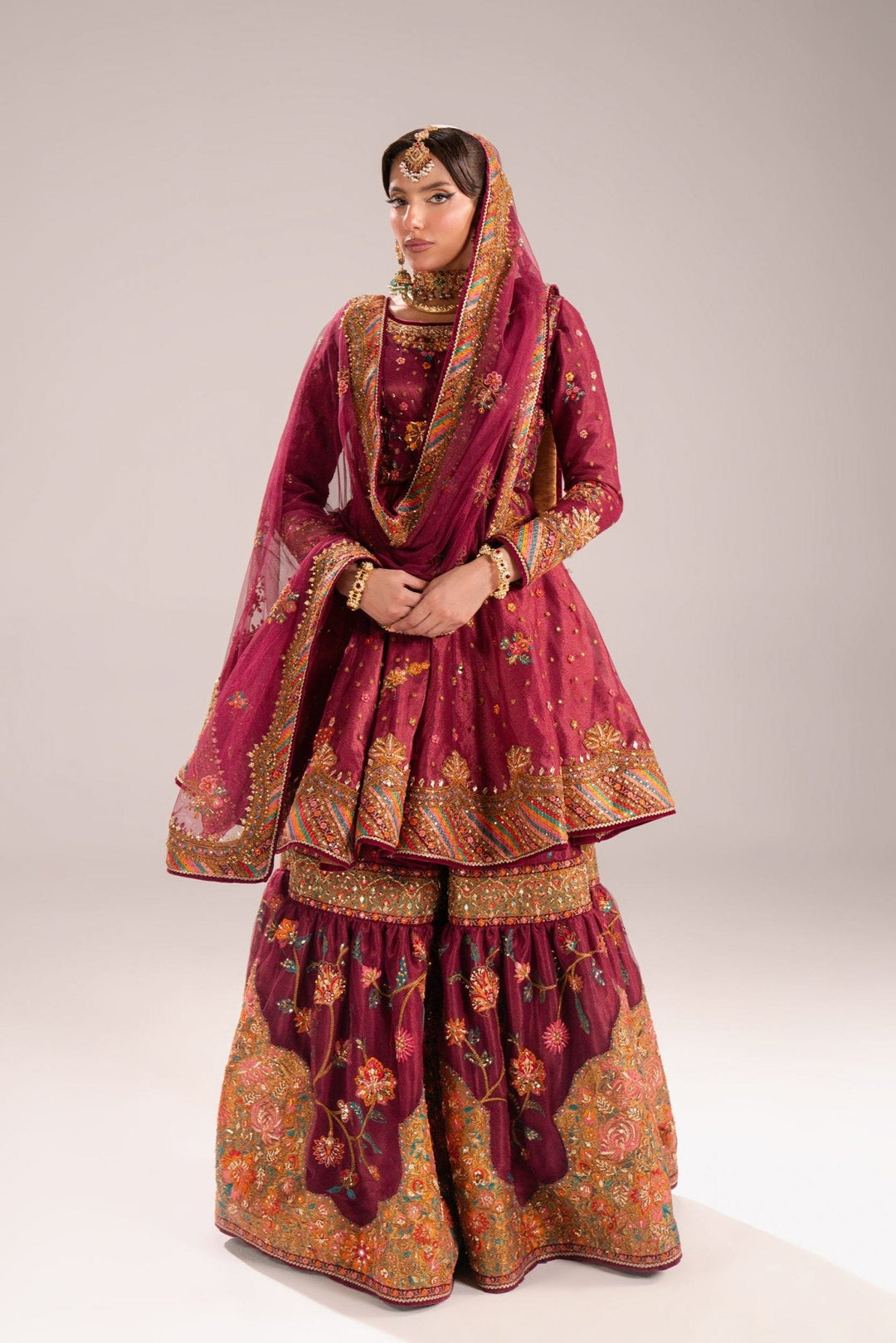 Pakistani Bridal Dress is Gharara and Peplum Style Online