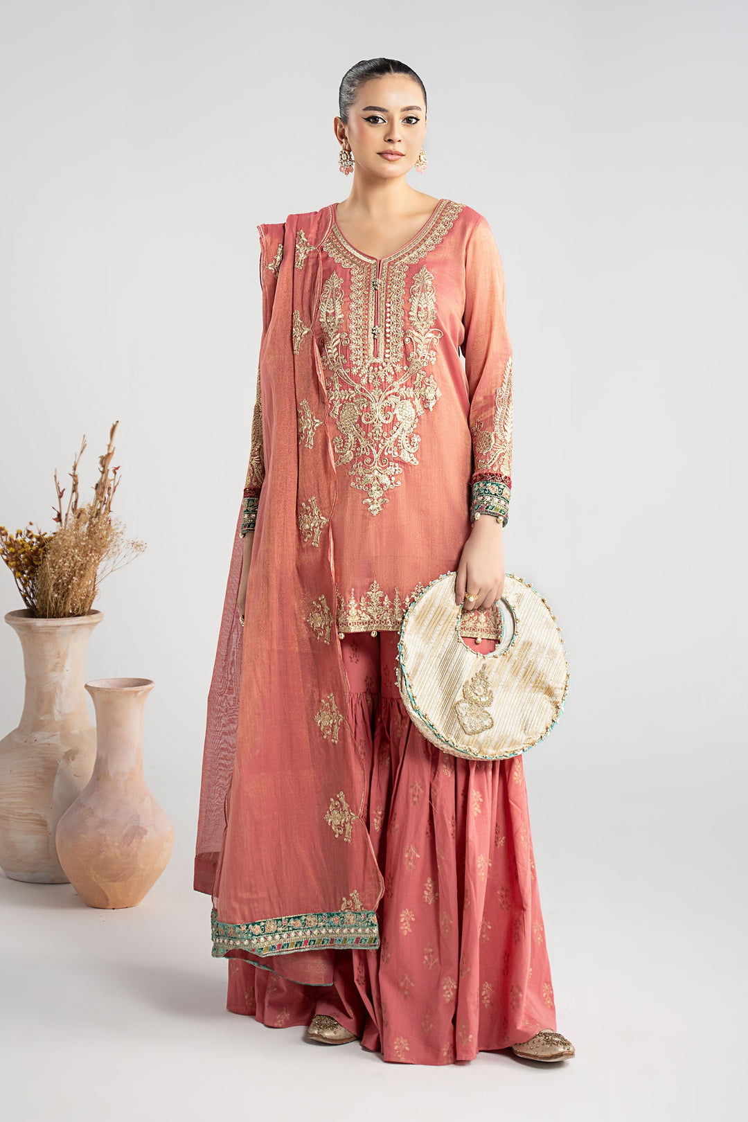 Elegant Pakistani Party Wear in Embroidered Masoori Suit