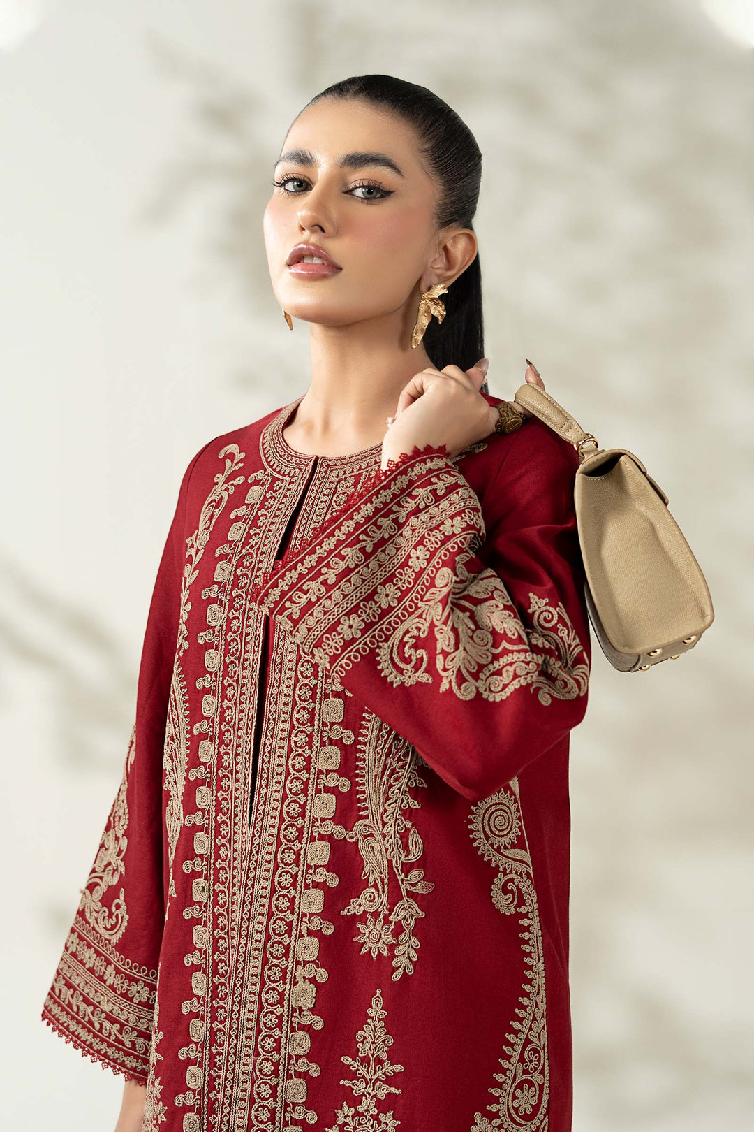 Pakistani Party Wear in Maroon Khaddar Suit Style