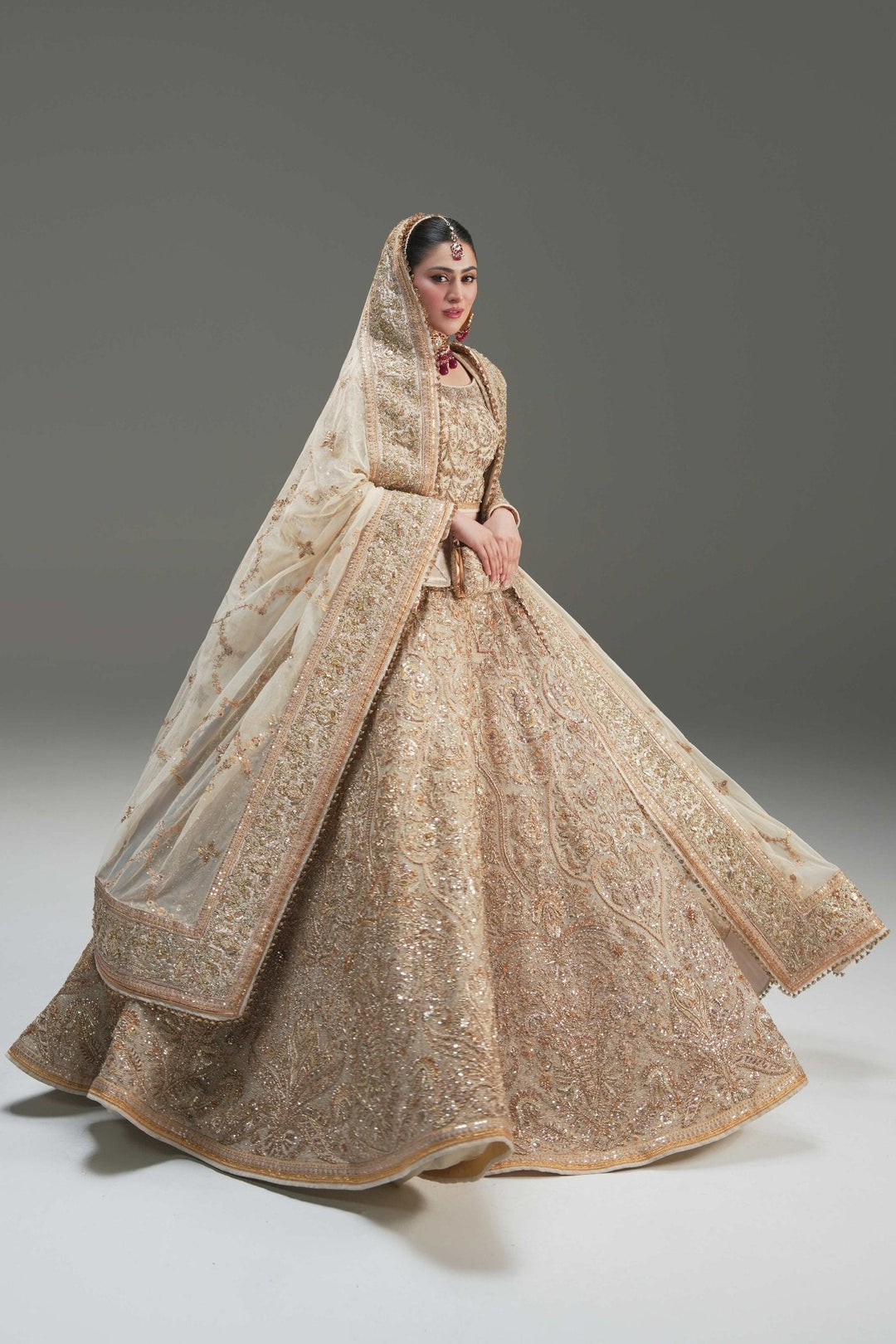 Elegant Pakistani Bridal Lehenga in Ivory Net Style