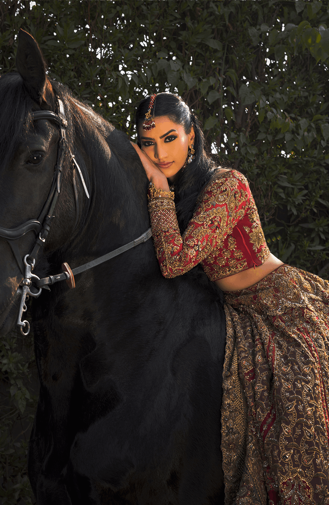 Red Pakistani Bridal Outfit in Choli and Lehenga Style