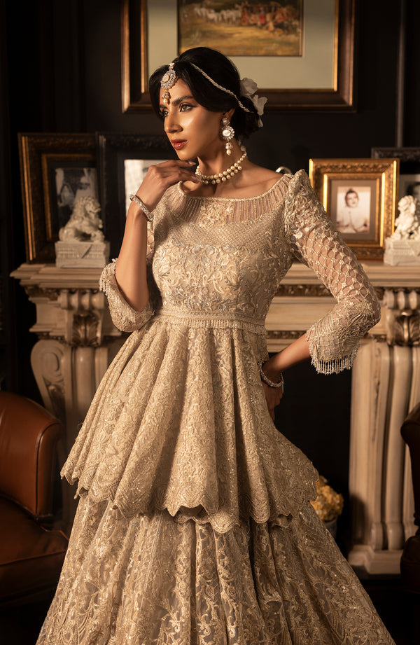 Royal Pakistani Bridal Dress in Ivory Peplum Lehenga Style
