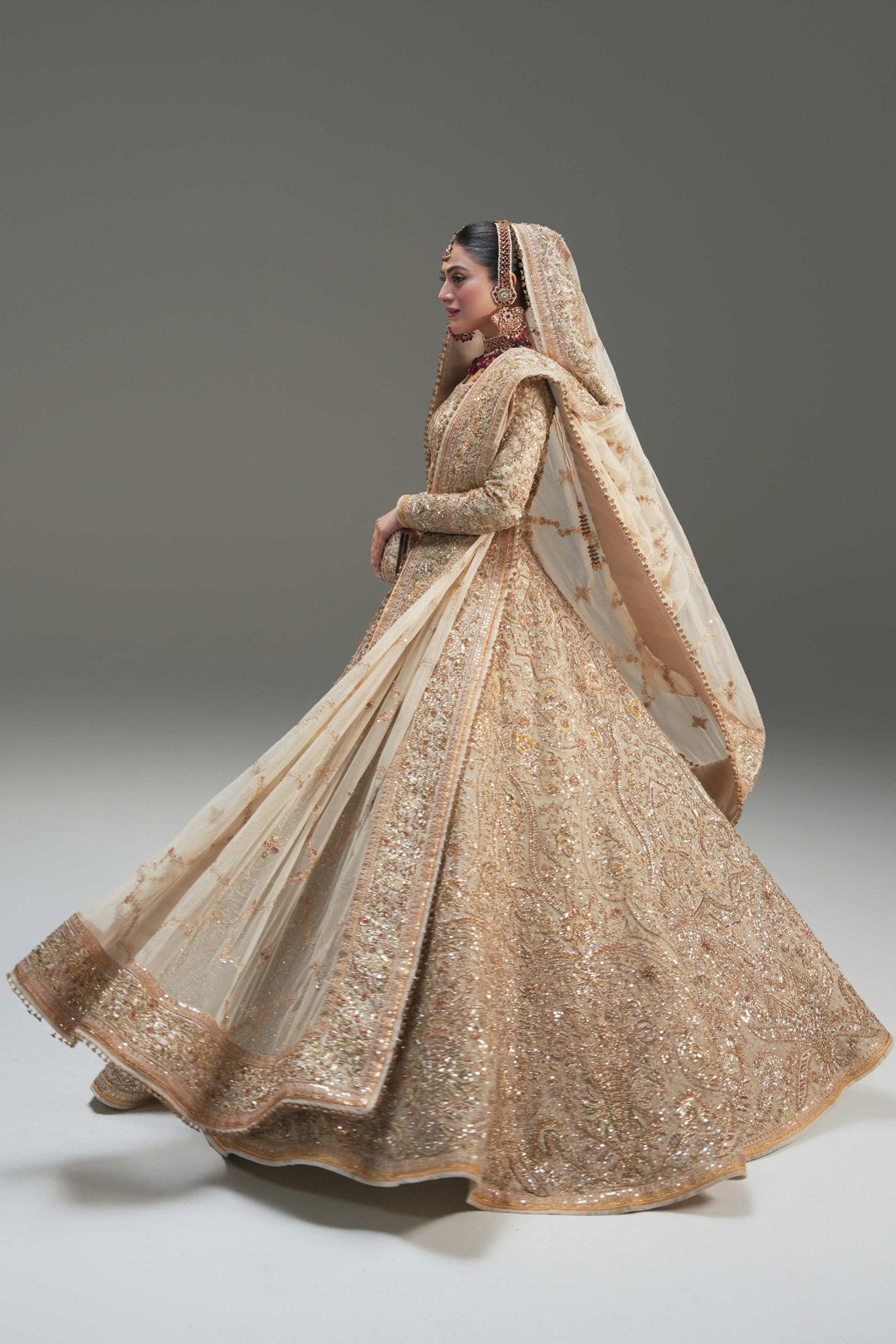 Elegant Pakistani Bridal Lehenga in Ivory Net Style