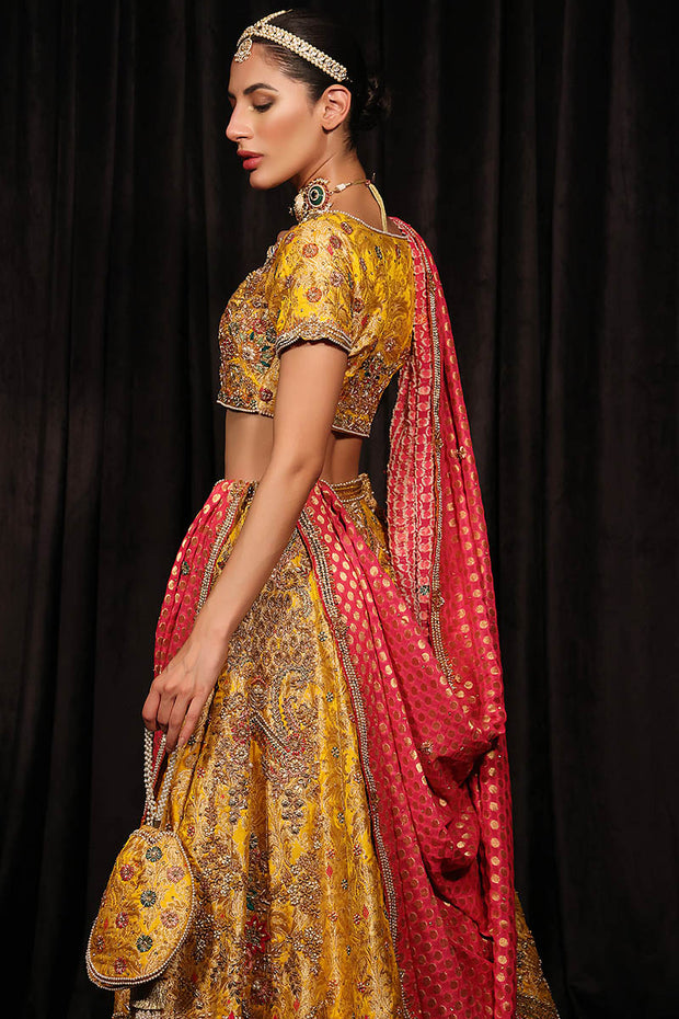 Royal Yellow Lehenga Choli and Pink Dupatta Mehndi Dress