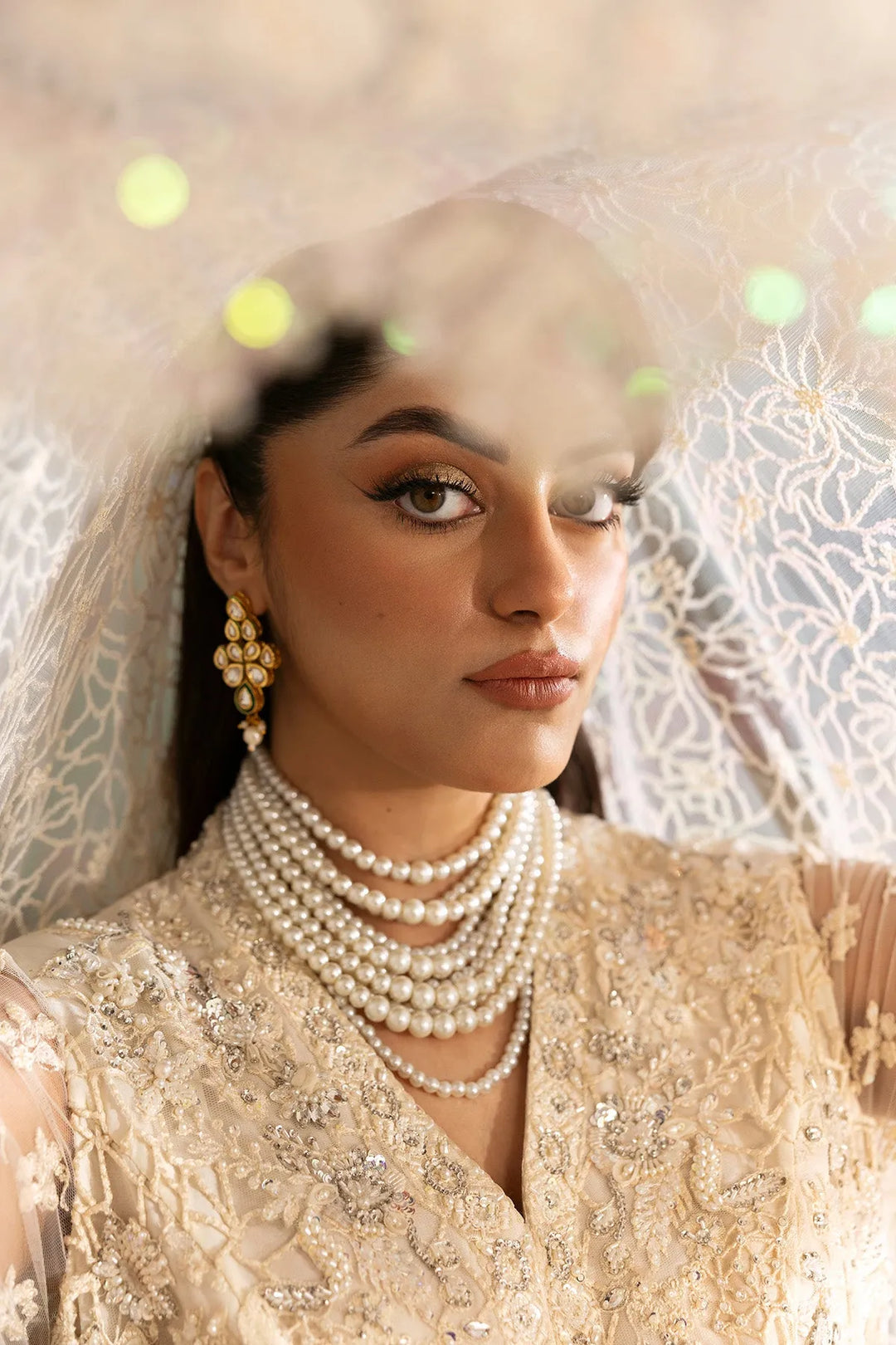 Elegant Pakistani Bridal Suit with Embroidered Details