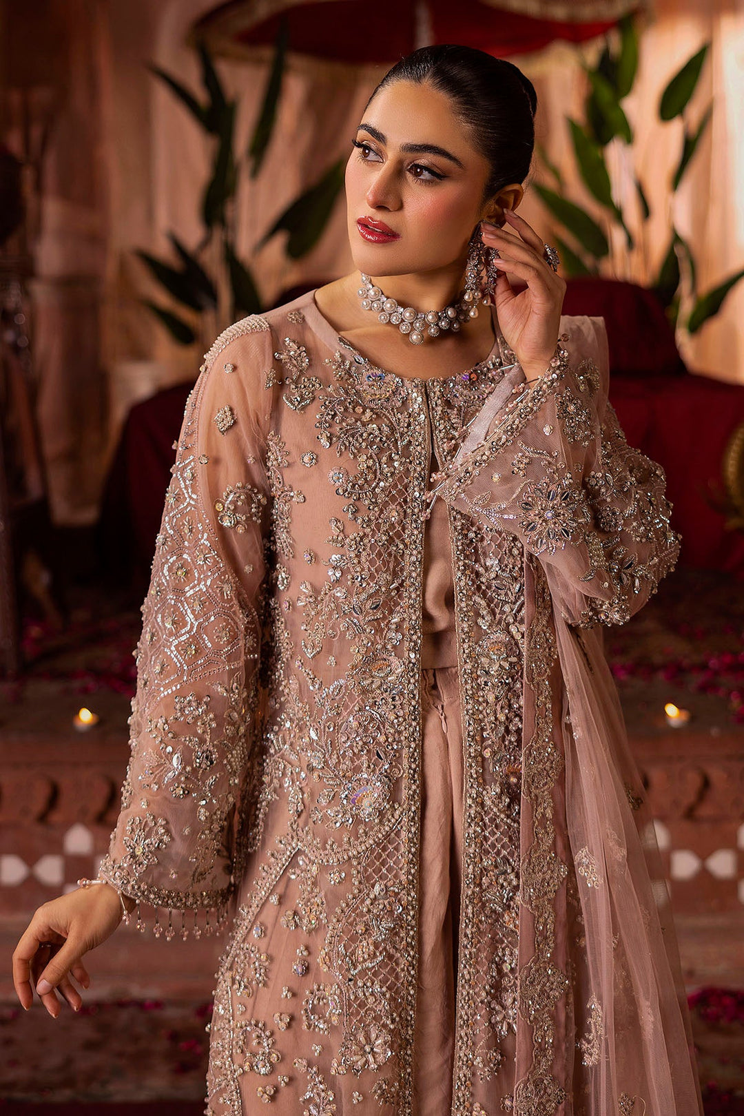Elegant Pastel Pink Pakistani Bridal Dress with Intricate Embroid