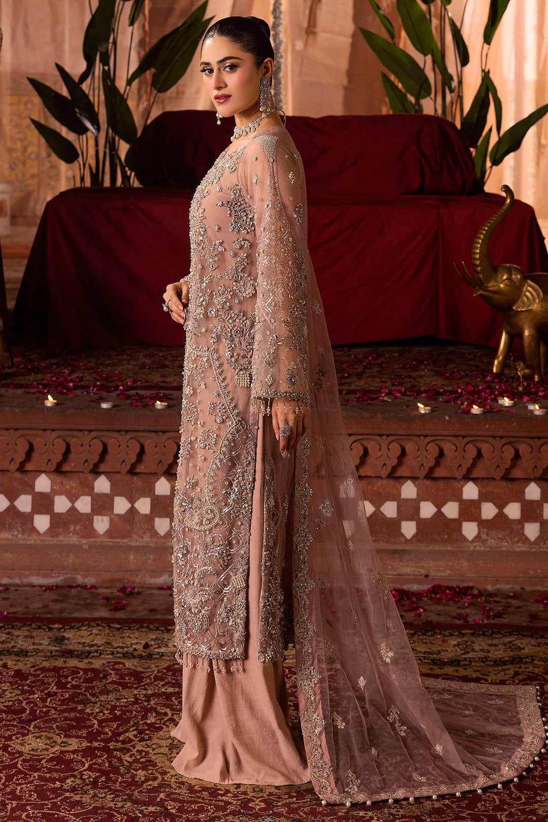 Elegant Pastel Pink Pakistani Bridal Dress with Intricate Embroid
