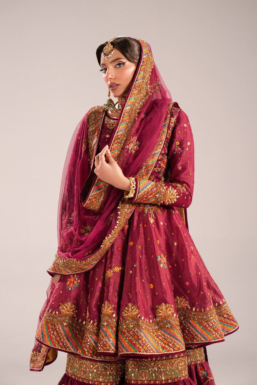 Stunning Pakistani Bridal Dress is Gharara and Peplum Style