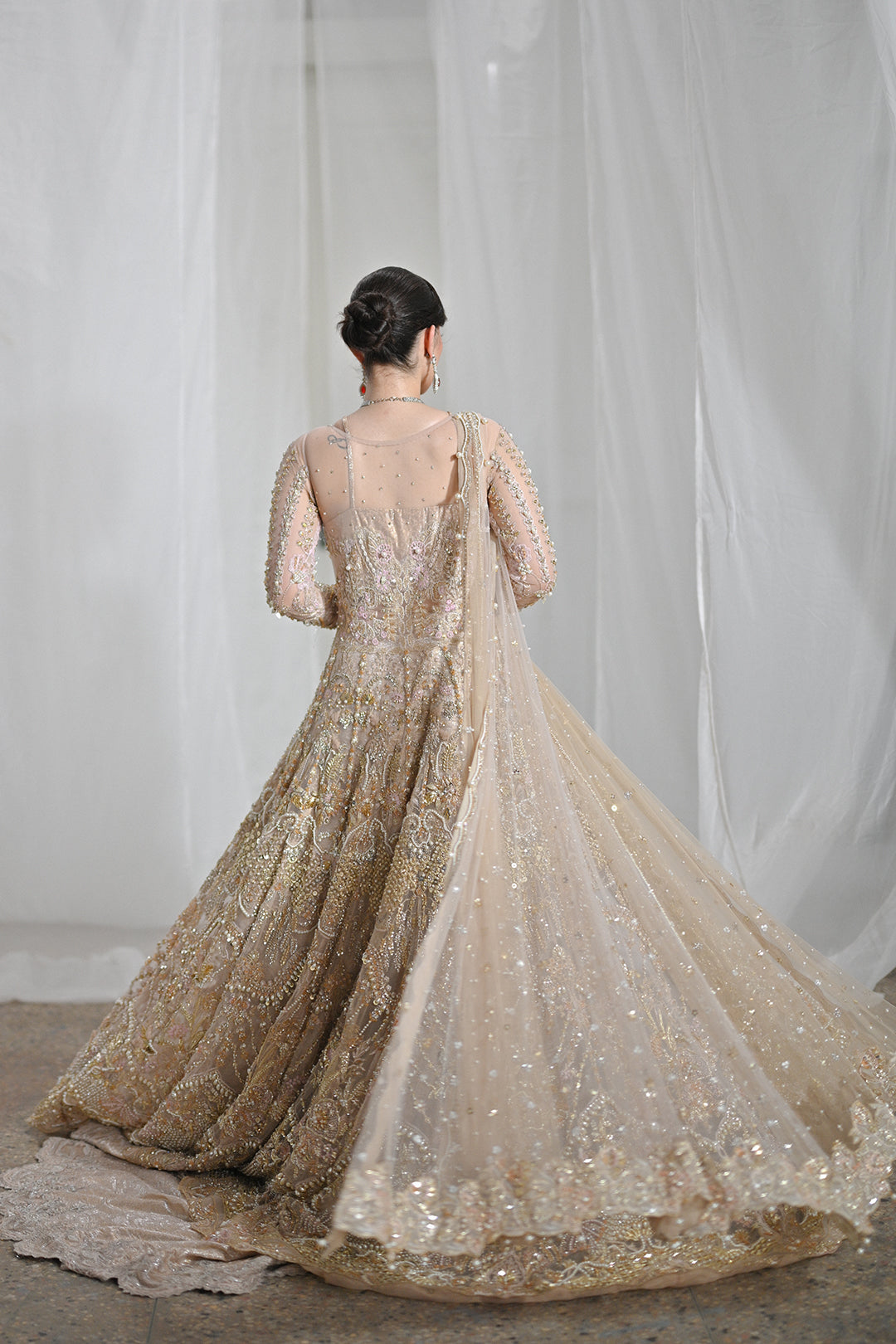 Rose Gold Pakistani Bridal Lehenga with Elegant Embroidery