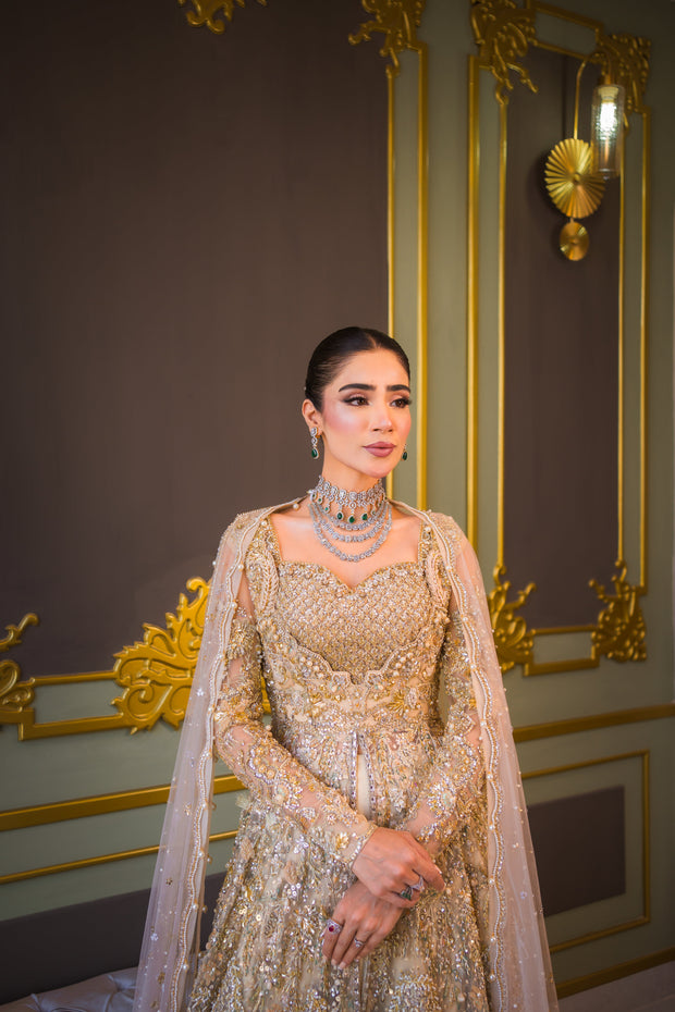 Subtle Gold Pakistani Bridal Outfit with Elegant Embroidery