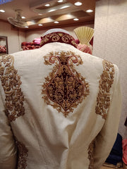 Pakistani Sherwani Royal Look In Off White Color. With  Jama War Cloth.Work Embellished With    Valvet Appliqué,Dabka And Zardozi Work.Royal Look Turban Also Available.