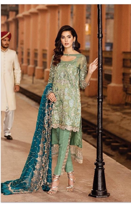 Pakistani Party Suit In Mint Green Color.Work Embellished With Sitara Tilla,Threads Embroidery And Patches Work.