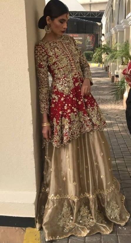 Beautiful bridal lahnga in maroon red and golden color