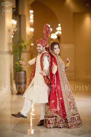Beautiful bridal dress in red color Side Pose