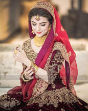 Bridal Reception Lahnga In Dark Maroon Color.Work Embalished With Pure Dabka Zari Sequance And Stone Work.