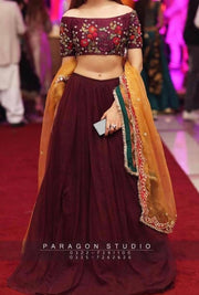 Indian Lahnga Choli In Dark Maroon Color.Work Embellished With Pure Threads Embroidery And Gota Work On Dupata.