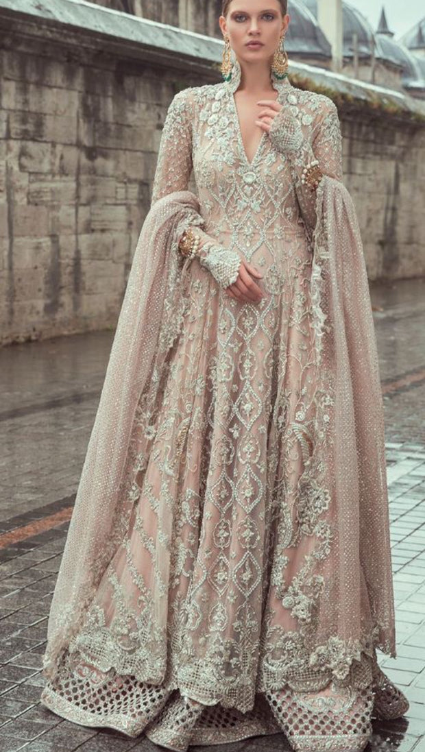Indian Bridal Lahnga In Beutifull Pink Color.Work Embellished With Dull Silver Dabka,Nagh,Zari,Pearls And Lahnga Cutwork.