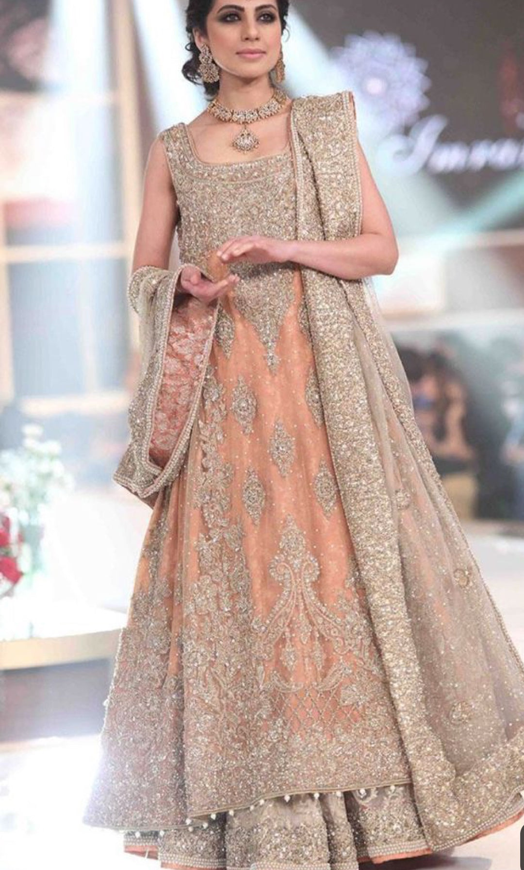 Asian Bridal Lahnga In Beutifull Peach Color.Work Embellished With Pure Dull Gold Silver Dabka Nagh Pearls,Zari, Moti And Load Work Dabka.