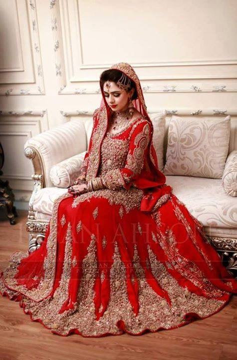 Bridal lahnga in red color with heavy dabka loaf work with crystal perls and nagh work Model#B1003