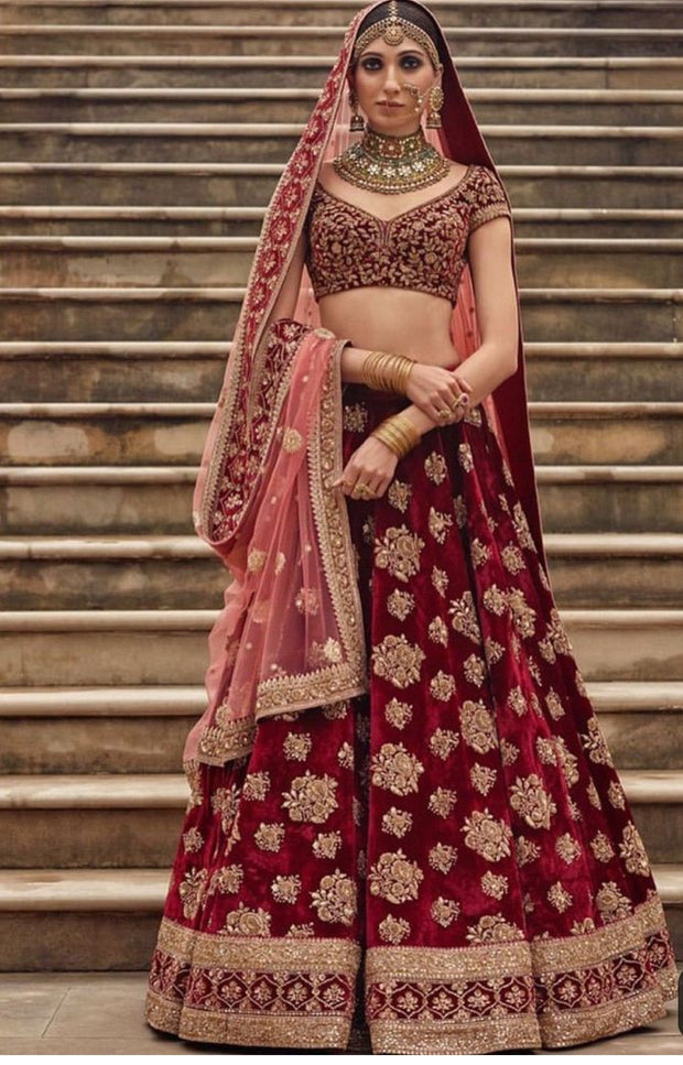 Classy Indian Bridal Dress In Maroon And Pink Color.Work Embellished With Pure Dabka,Nagh,Zari,Sequance And Zardozi Work.