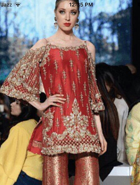 Pakistani Dulhan Suit In Beautiful Maroon Color.Work Embalished With Dull Golden Dabka ,Nagh,Zari,Stone And Pearls.