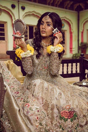 Beautiful bridal lahnga in red and gold with heavy dabka nagh pearls threds and crystals work 
