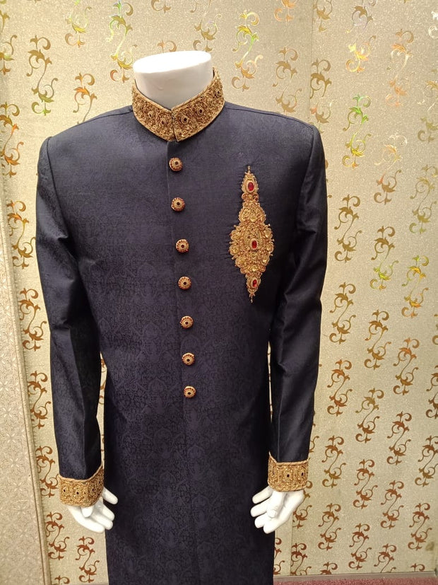 Latest Sherwani In Blue Jamawar Fabric.work Embellished With Ban,Cuff And Buttons With Pure Dabka,Zari,Zardozi & Stone Work.