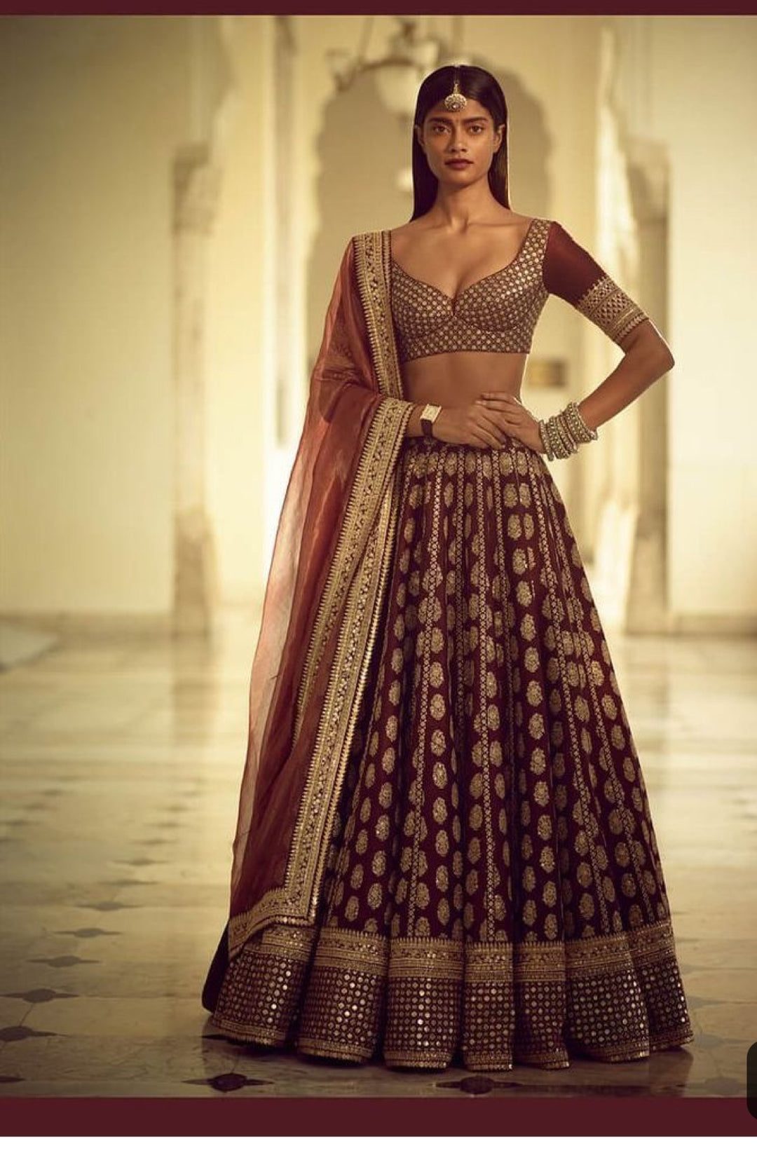 Maroon Bridal Ghaghra Choli In Dark Maroon Color.Work Embellished With Dabka,Zari,Nagh,And,Sequance Work.