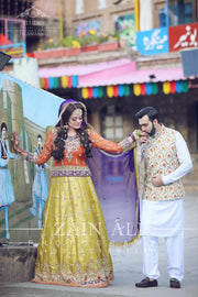 Stylish Mehndi Attire In Orange Green And Purple Color.Work Embellished With Dabka Zari And Gota Work.