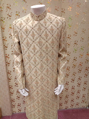 Pakistani Latest Sherwani In Offwhite Gold Color Work Embellished With Pure Dabka And Beeds Work.Same Work on Khusa.