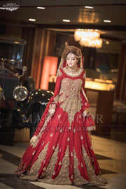 Red Dulhan Maxi in Lahnga Shape.Stylish Bridal Lahnga Maxi Embalished With Pure Dabka Nagh Zari And Pearls Work.