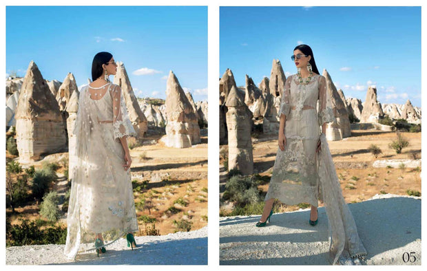 Pakistani Party Dress In Pearl White Color by Zainab Chotani.With Threads Embroidery And Sequance.