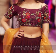 Indian Lahnga Choli In Dark Maroon Color.Work Embellished With Pure Threads Embroidery And Gota Work On Dupata.