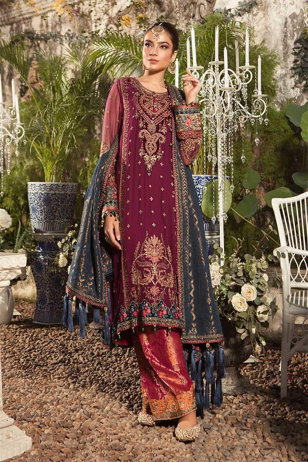 Punjabi Wedding Dress In Maroon Color.Work Emballished In Zari,Tilla,Dhaga Embroidery Or Valvet.