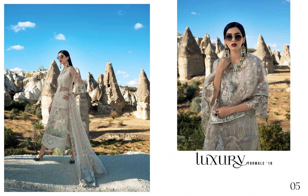 Pakistani Party Dress In Pearl White Color by Zainab Chotani.With Threads Embroidery And Sequance.