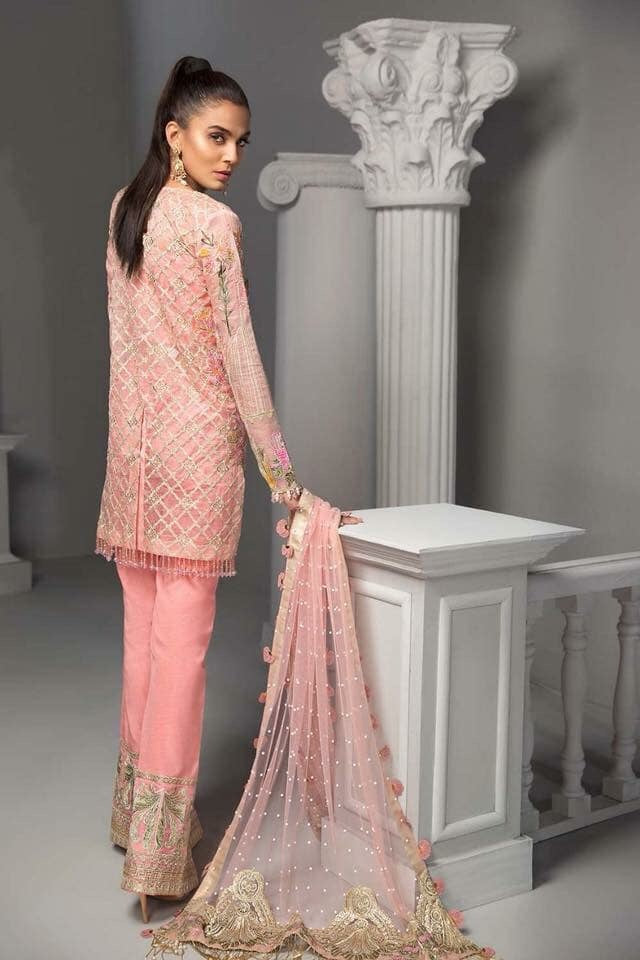 Asian Stylish Dress In Beutifull Short Shirt & Boot Pants.In Beutifull Pink Color Work Embellished With Hand Work & Multi Threads Embroidery.