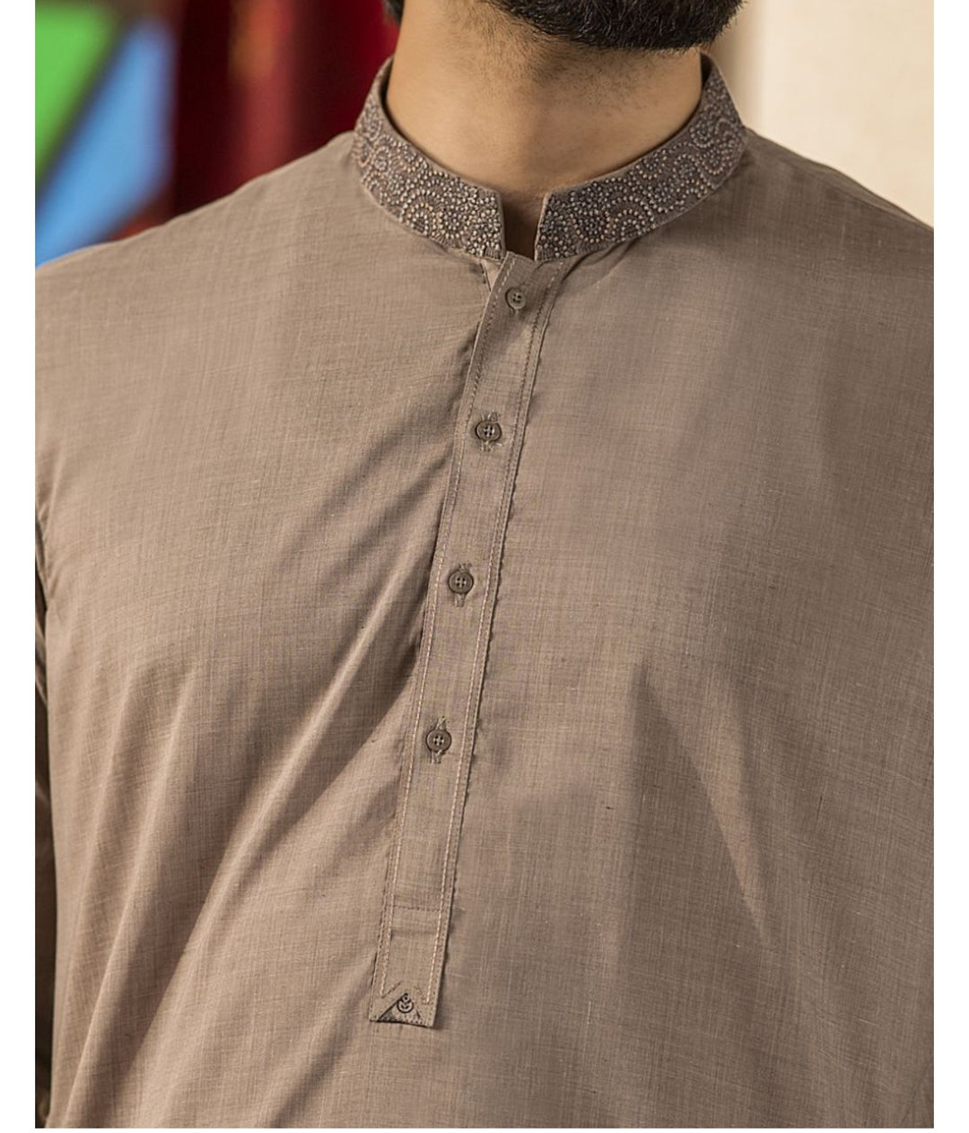 Pakistani Men Dress in Light Brown Color.Pure Threads Embroidery On Neck And Collar.