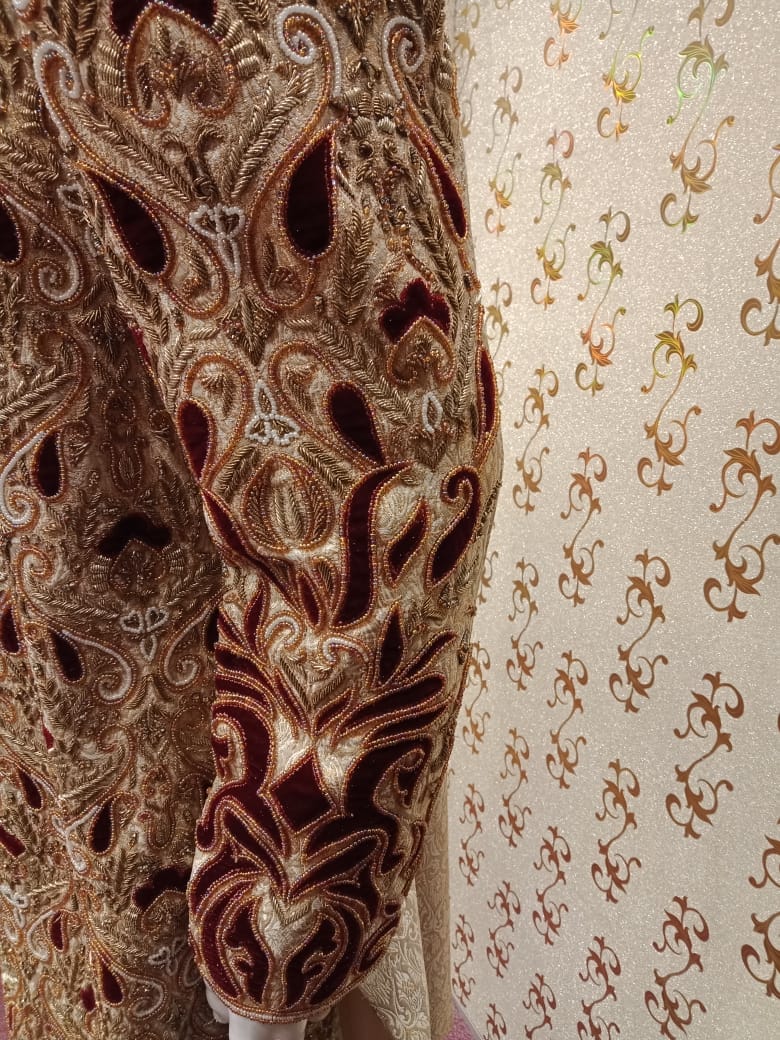 Dulha Sherwani In Offwhite Gold Color.Work  With Full Velvet Appliqué,Zardozi,Dabka & Stone Work. Same Work On Khusa.