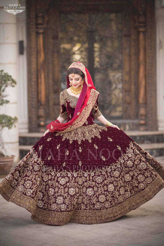 Bridal Reception Lahnga In Dark Maroon Color.Work Embalished With Pure Dabka Zari Sequance And Stone Work.