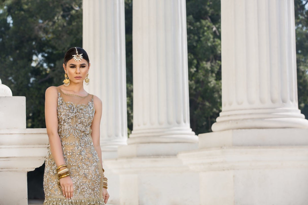 Beautiful embroidered Asian bridal out in alluring gold color