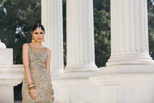 Beautiful embroidered Asian bridal out in alluring gold color